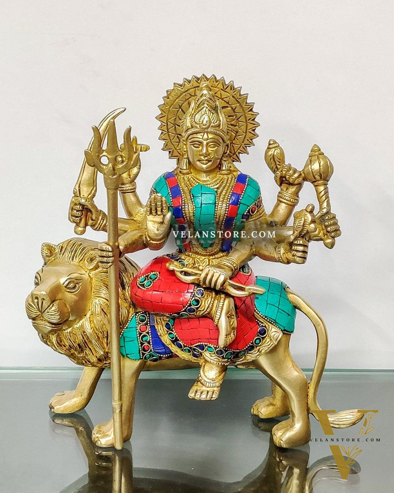 Goddess Durga brass idol with 8 arms sitting on lion with stonework 9 inches