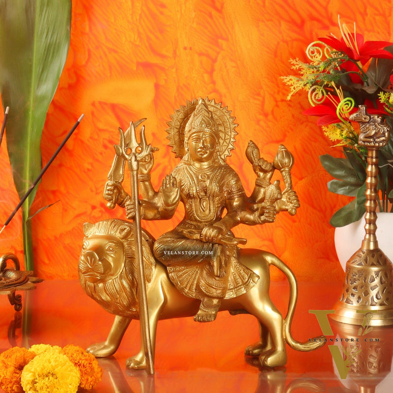 Goddess Durga brass idol with 8 arms sitting on lion with stonework 9 inches
