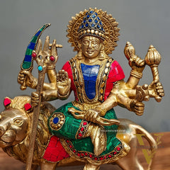 Goddess Durga brass idol with 8 arms sitting on lion with stonework 9 inches