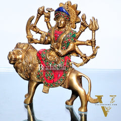 Goddess Durga brass idol with 8 arms sitting on lion with stonework 7.5 inches