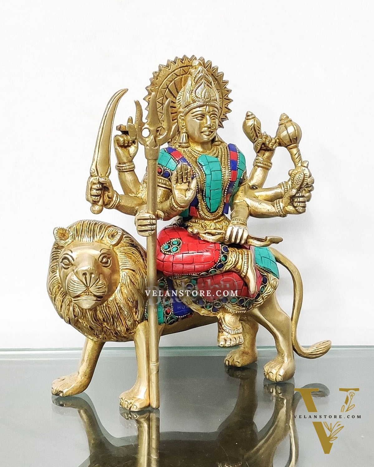 Goddess Durga brass idol with 8 arms sitting on lion with stonework 9 inches