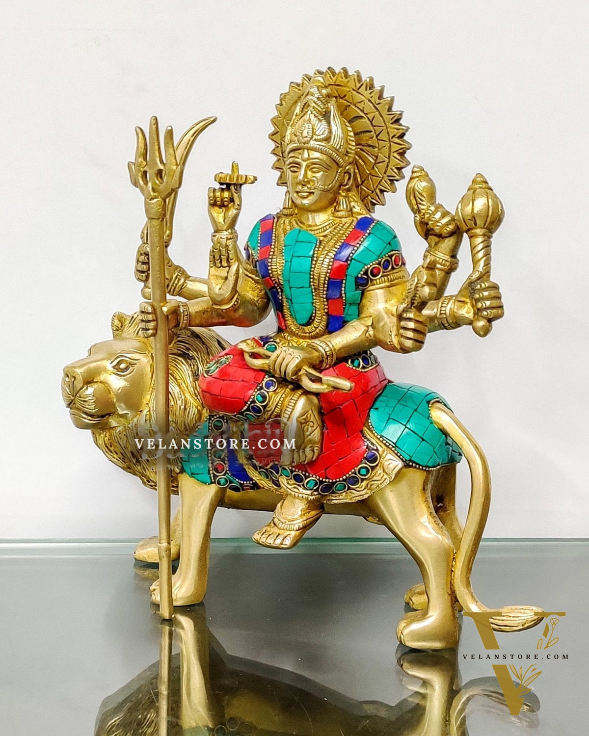 Goddess Durga brass idol with 8 arms sitting on lion with stonework 9 inches