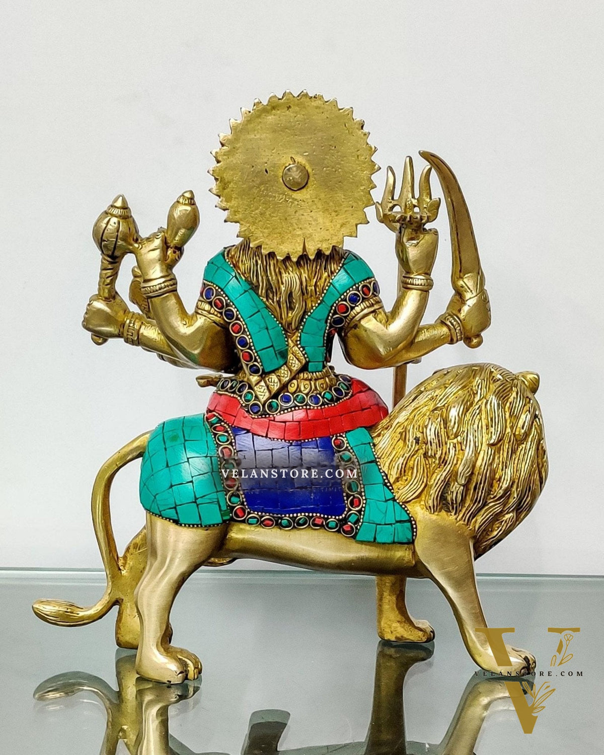 Goddess Durga brass idol with 8 arms sitting on lion with stonework 9 inches