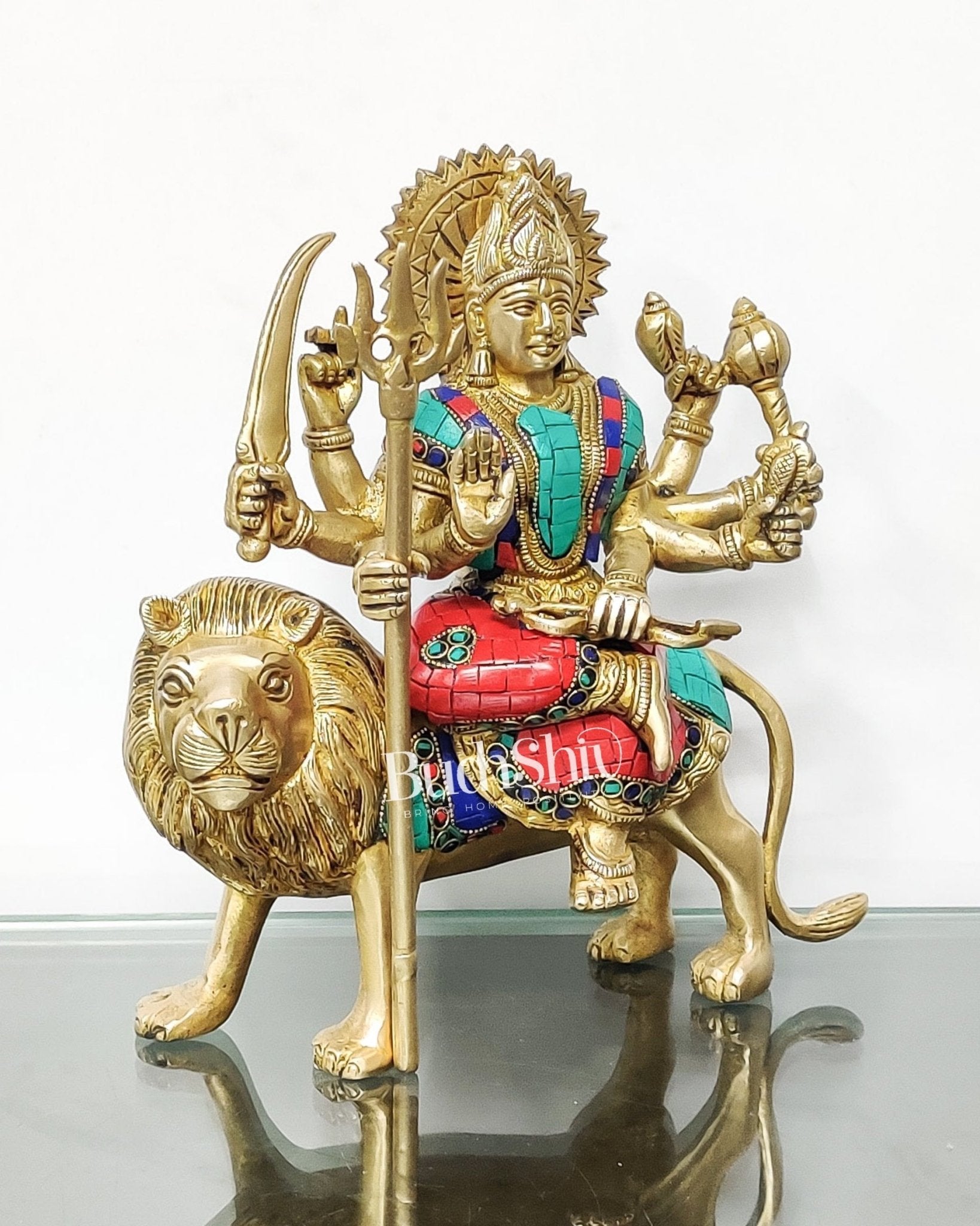 Goddess Durga brass idol with 8 arms sitting on lion with stonework 9 inches