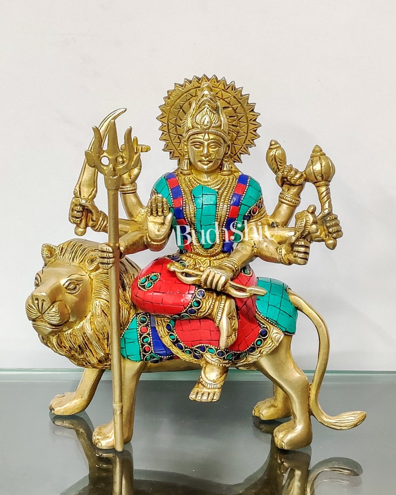 Goddess Durga brass idol with 8 arms sitting on lion with stonework 9 inches
