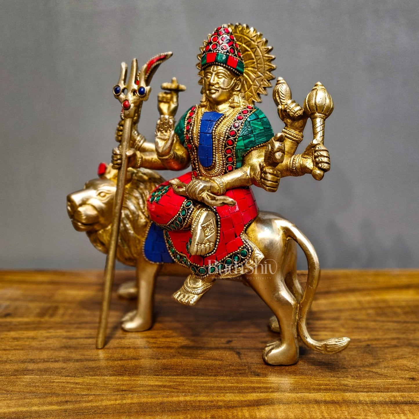 Goddess Durga brass idol with 8 arms sitting on lion with stonework 9 inches