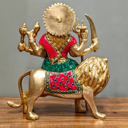 Goddess Durga brass idol with 8 arms sitting on lion with stonework 9 inches