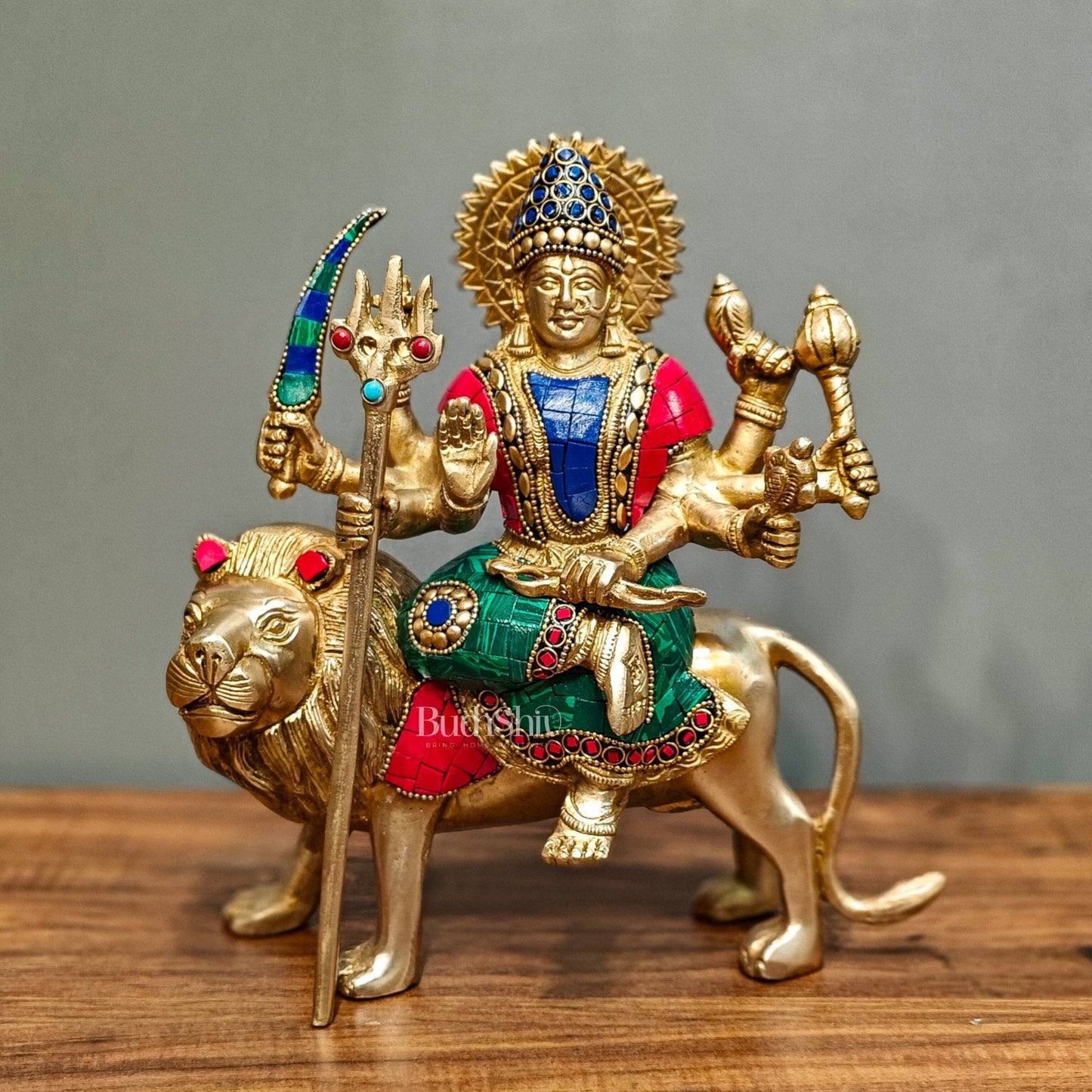 Goddess Durga brass idol with 8 arms sitting on lion with stonework 9 inches