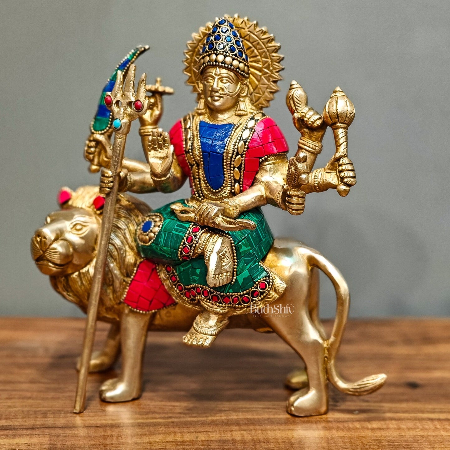 Goddess Durga brass idol with 8 arms sitting on lion with stonework 9 inches