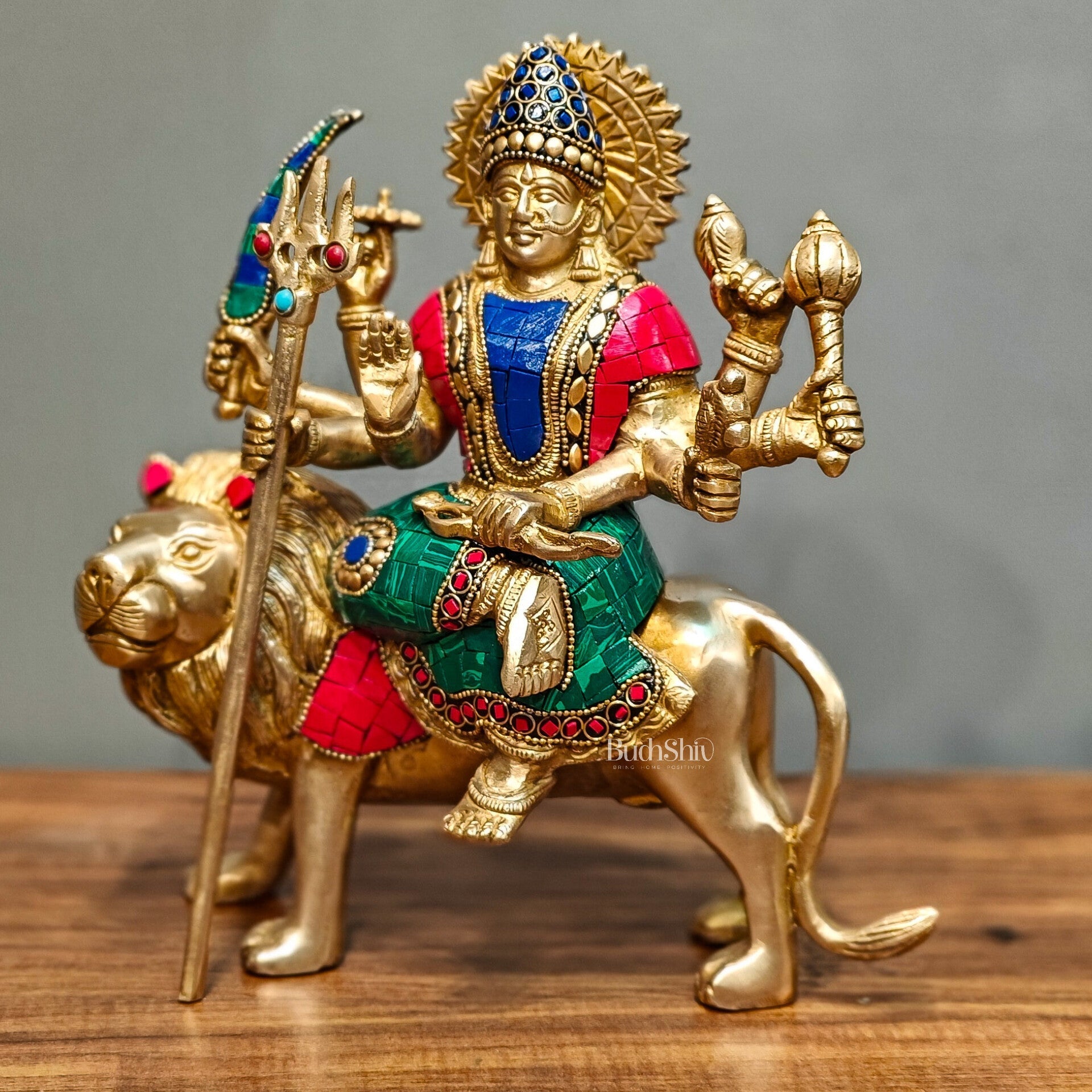 Goddess Durga brass idol with 8 arms sitting on lion with stonework 9 inches
