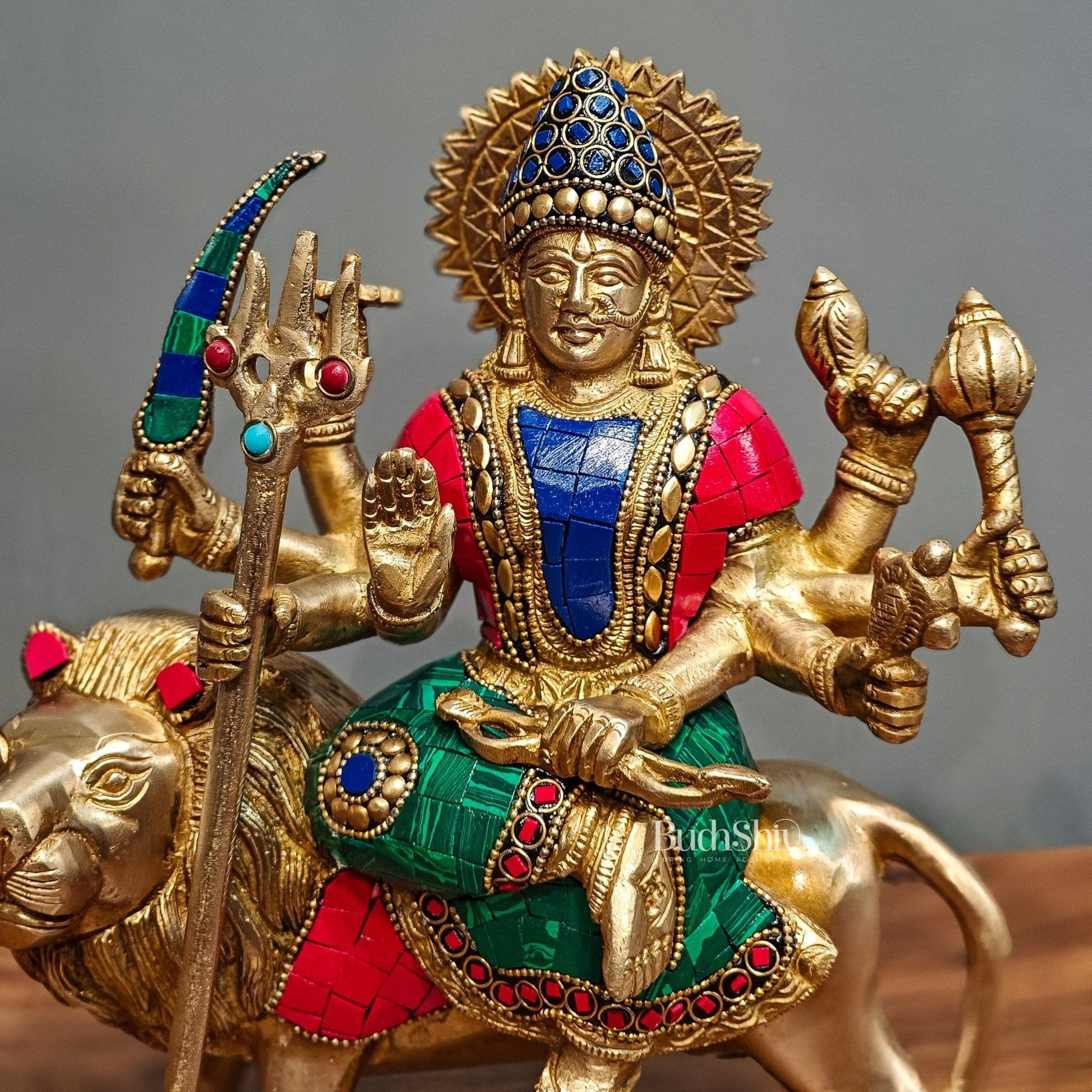 Goddess Durga brass idol with 8 arms sitting on lion with stonework 9 inches