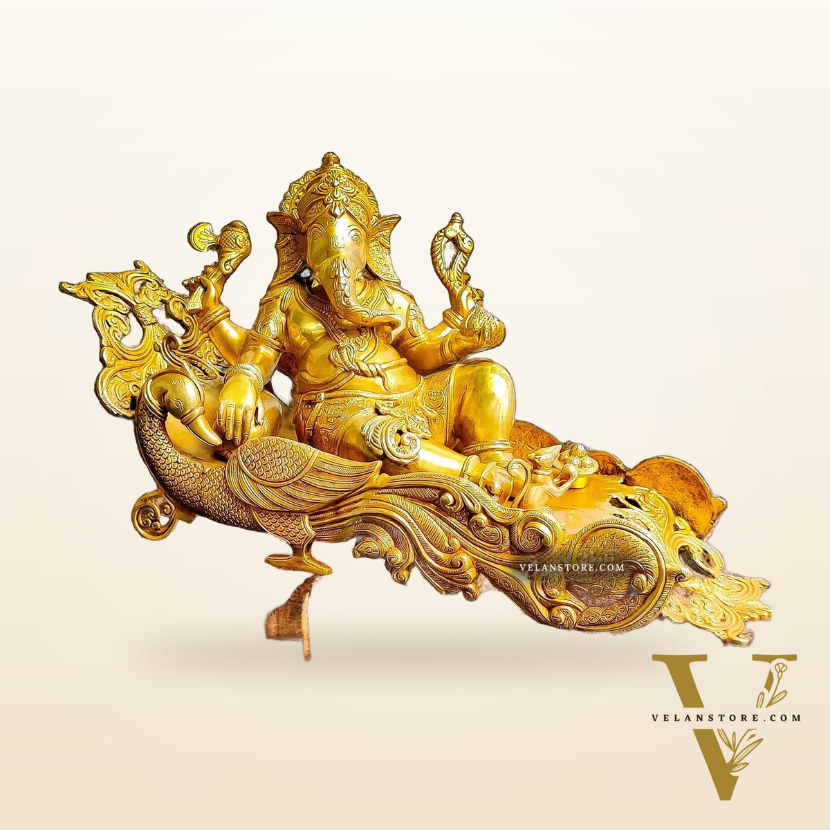Handcrafted Brass Ganesha Resting on Peacock Bed | Divine Golden Finish 33"
