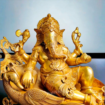 Handcrafted Brass Ganesha Resting on Peacock Bed | Divine Golden Finish 33"
