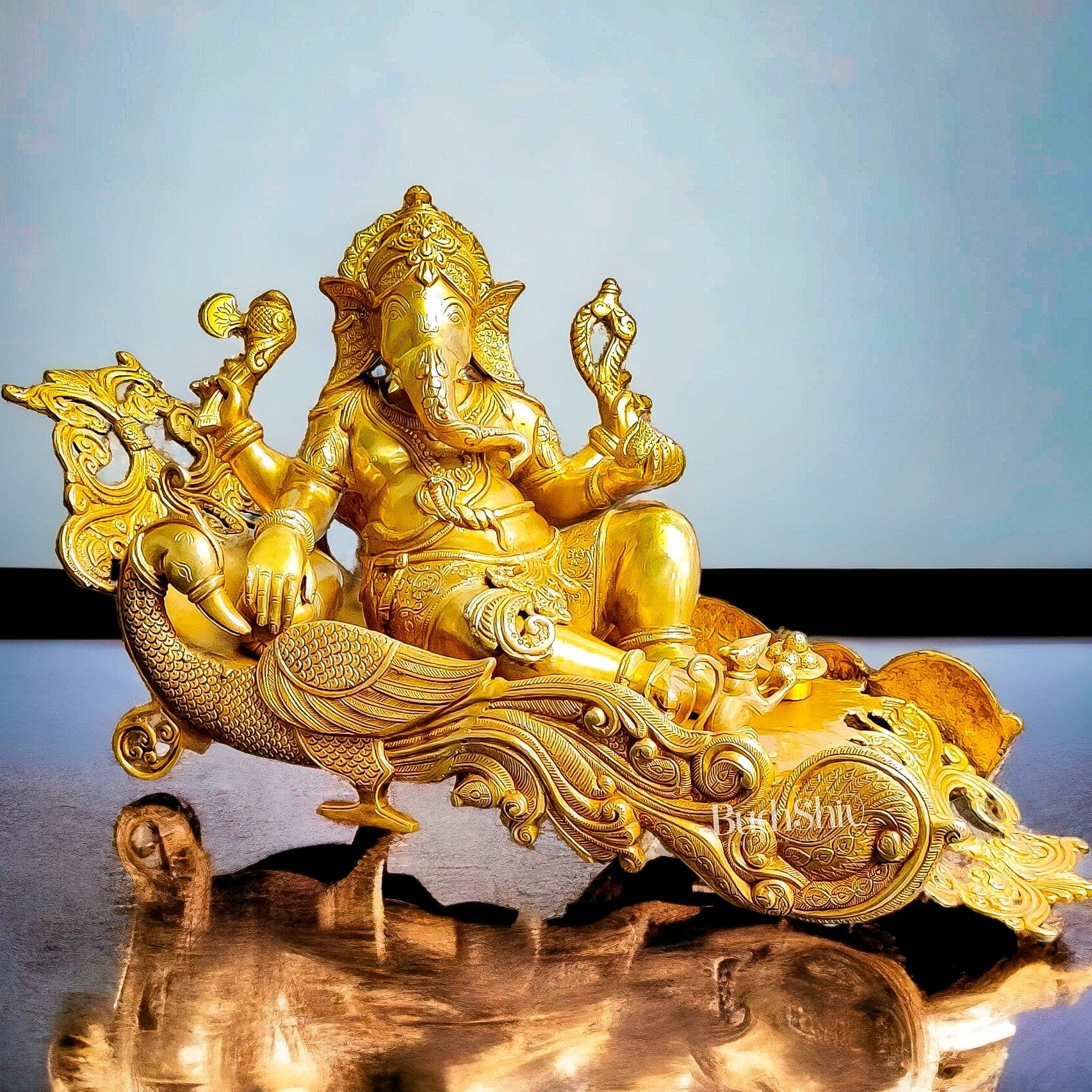 Handcrafted Brass Ganesha Resting on Peacock Bed | Divine Golden Finish 33"
