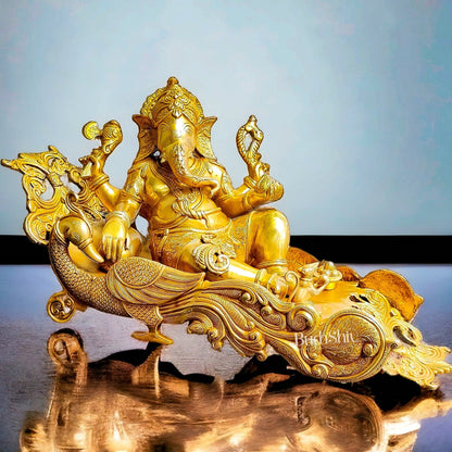 Handcrafted Brass Ganesha Resting on Peacock Bed | Divine Golden Finish 33"