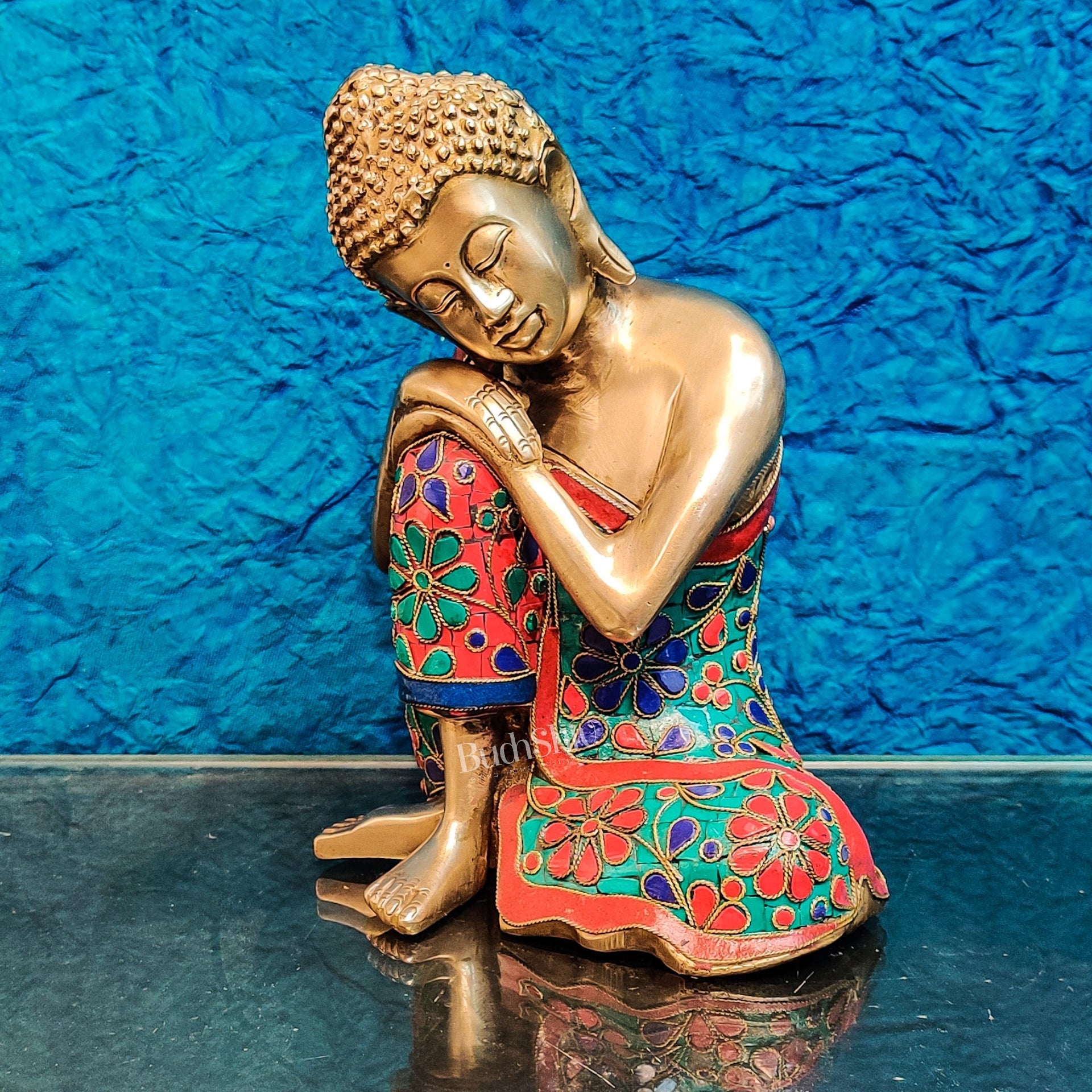 Handcrafted Brass Thinking Buddha Statue with flora meenakari stonework, 9" x 6.5" x 5"