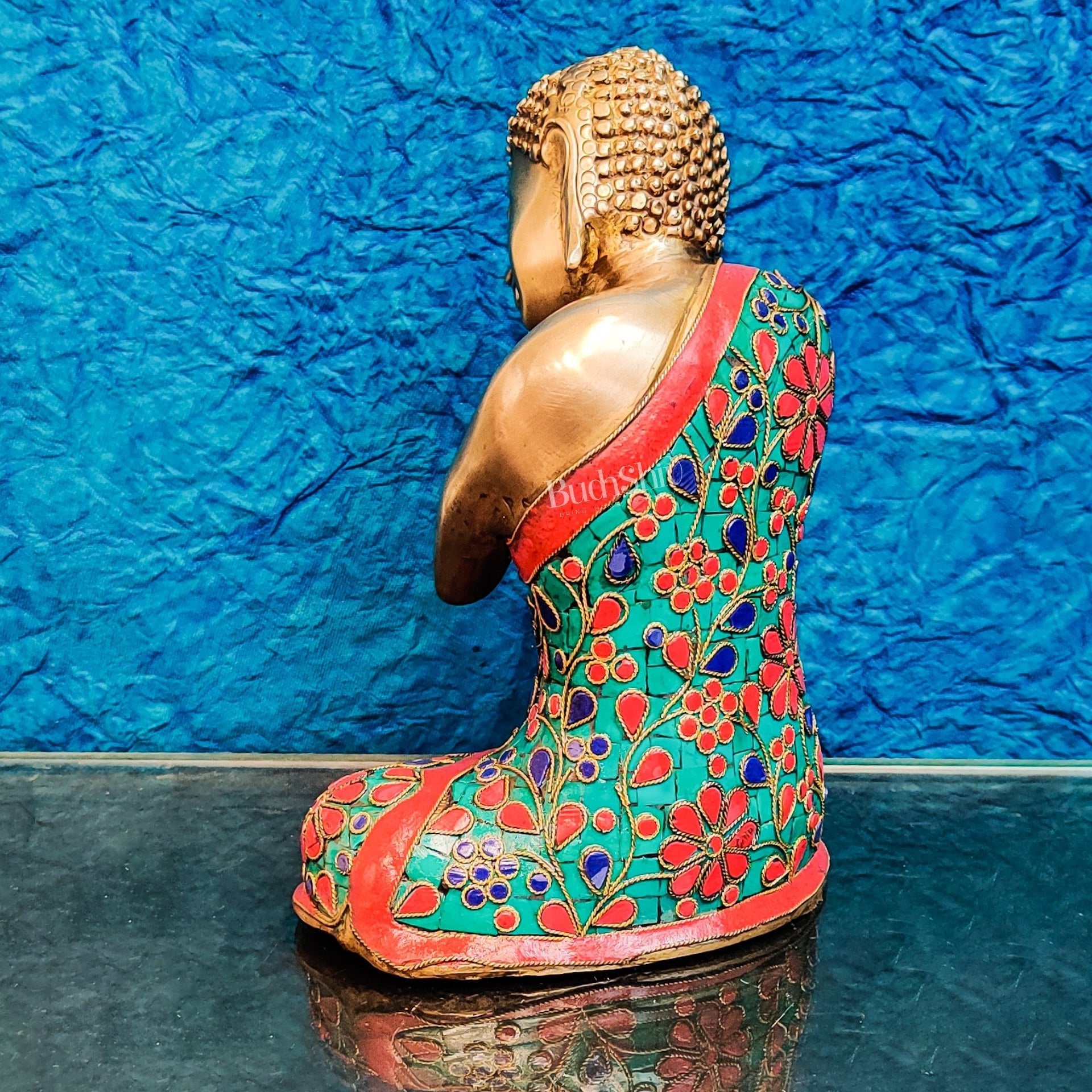 Handcrafted Brass Thinking Buddha Statue with flora meenakari stonework, 9" x 6.5" x 5"