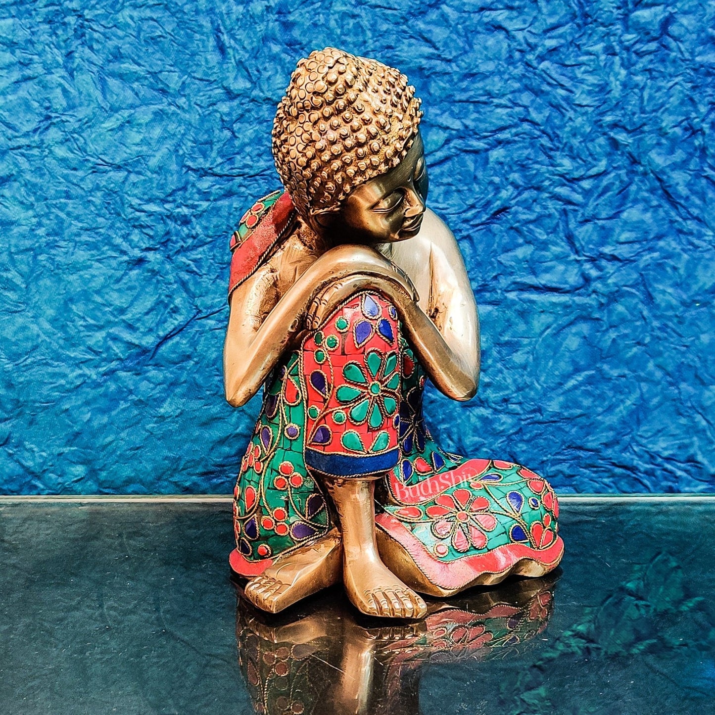 Handcrafted Brass Thinking Buddha Statue with flora meenakari stonework, 9" x 6.5" x 5"