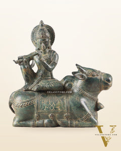 Indonesian Bronze Lord Krishna Sitting on Cow Sculpture | Height: 9 inch
