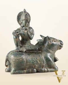 Indonesian Bronze Lord Krishna Sitting on Cow Sculpture | Height: 9 inch