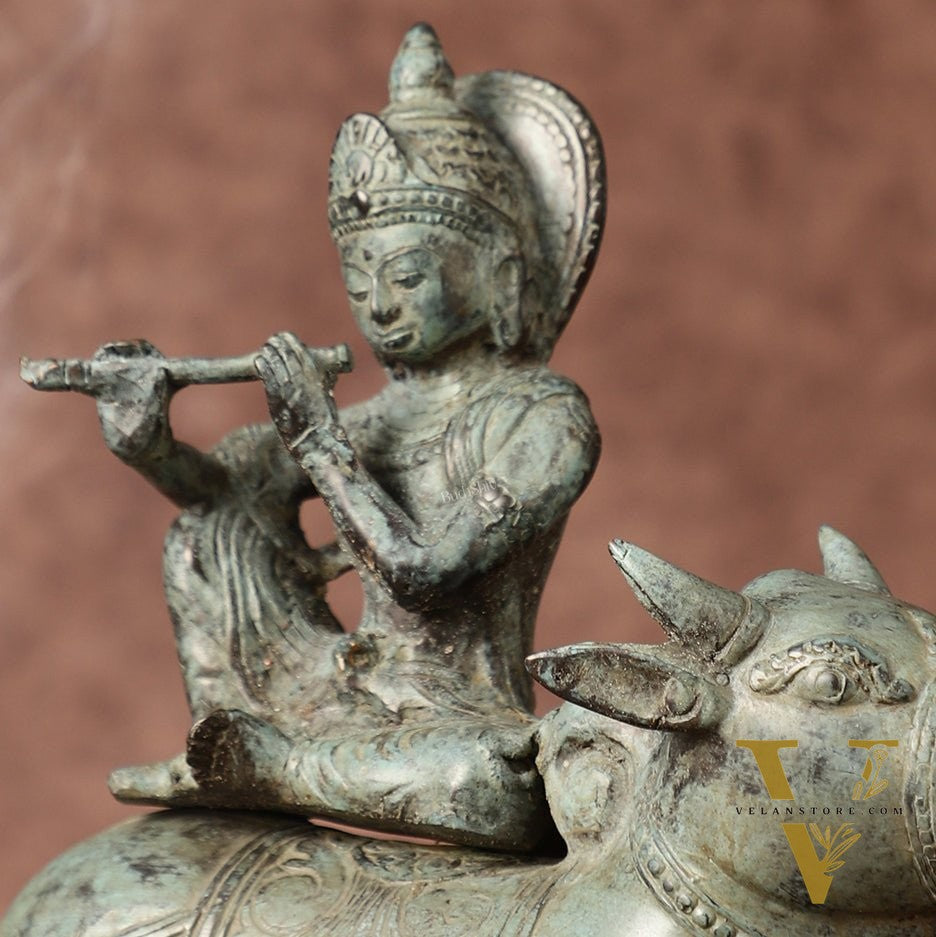 Indonesian Bronze Lord Krishna Sitting on Cow Sculpture | Height: 9 inch