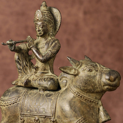 Indonesian Bronze Lord Krishna Sitting on Cow Sculpture | Height: 10 inch