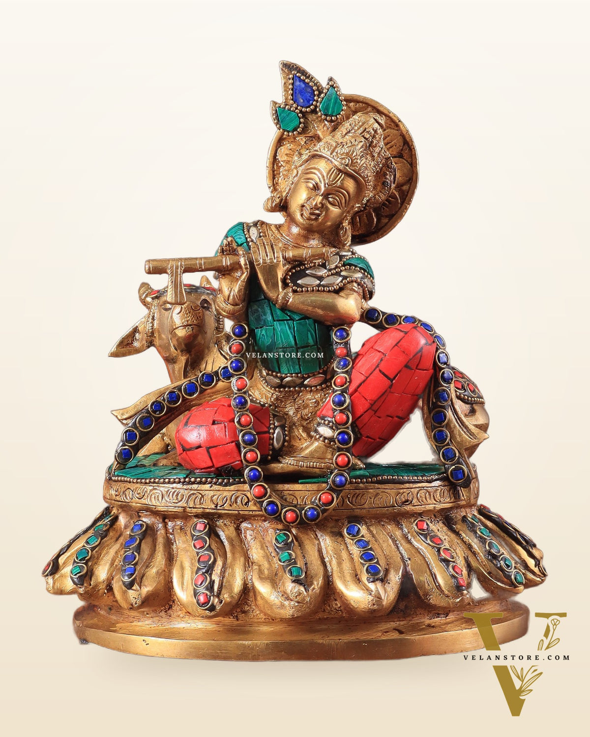 krishna seated with a cow on round base 7.5"