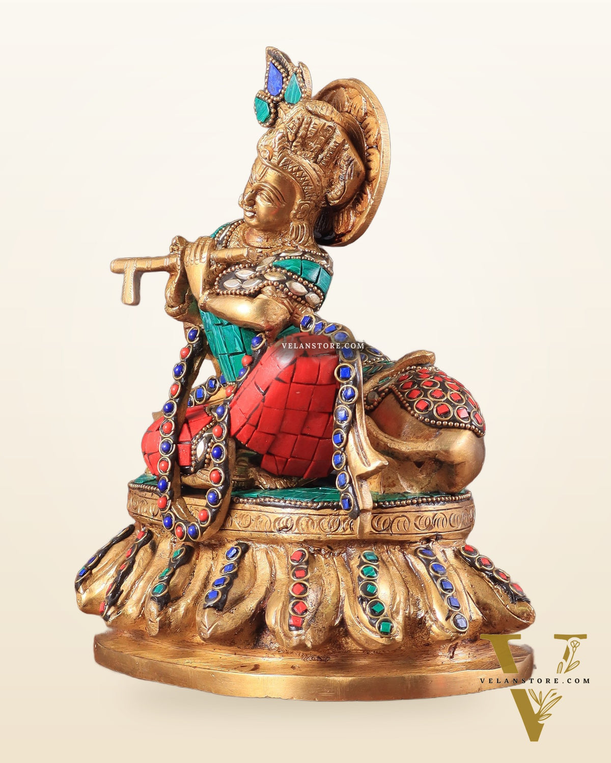 krishna seated with a cow on round base 7.5"