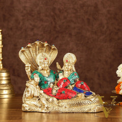 Lakshmi Narayan/ Vishnu Lakshmi brass idol resting on Sheshnaag Golden finish