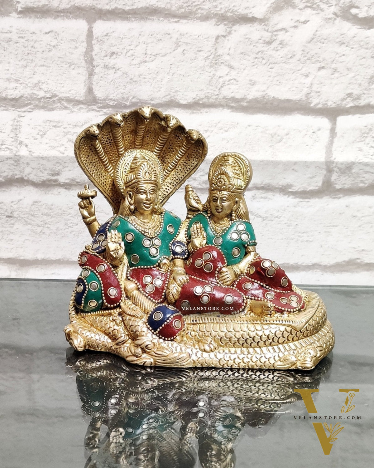Lakshmi Narayan/ Vishnu Lakshmi brass idol resting on Sheshnaag Golden finish
