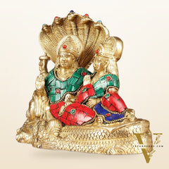 Lakshmi Narayan/ Vishnu Lakshmi brass idol resting on Sheshnaag Golden finish