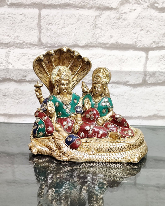Lakshmi Narayan/ Vishnu Lakshmi brass idol resting on Sheshnaag Golden finish