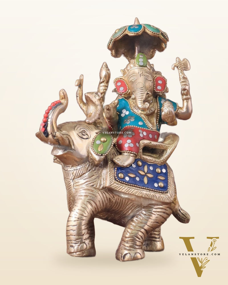 Lord Ganesha sitting on elephant meenakari brass statue