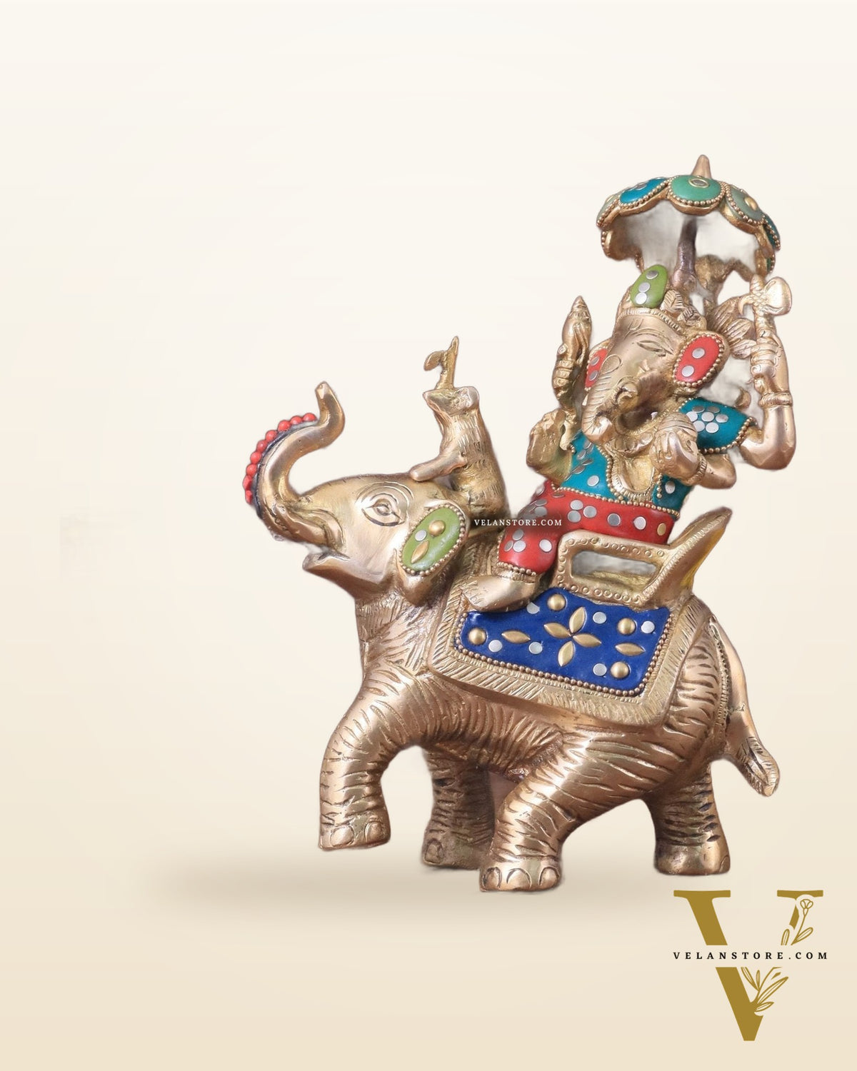 Lord Ganesha sitting on elephant meenakari brass statue