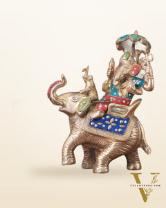 Lord Ganesha sitting on elephant meenakari brass statue