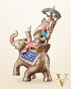 Lord Ganesha sitting on elephant meenakari brass statue