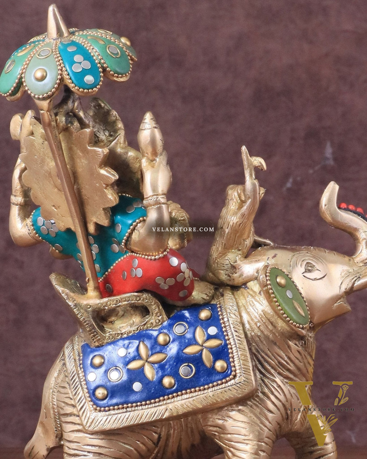 Lord Ganesha sitting on elephant meenakari brass statue