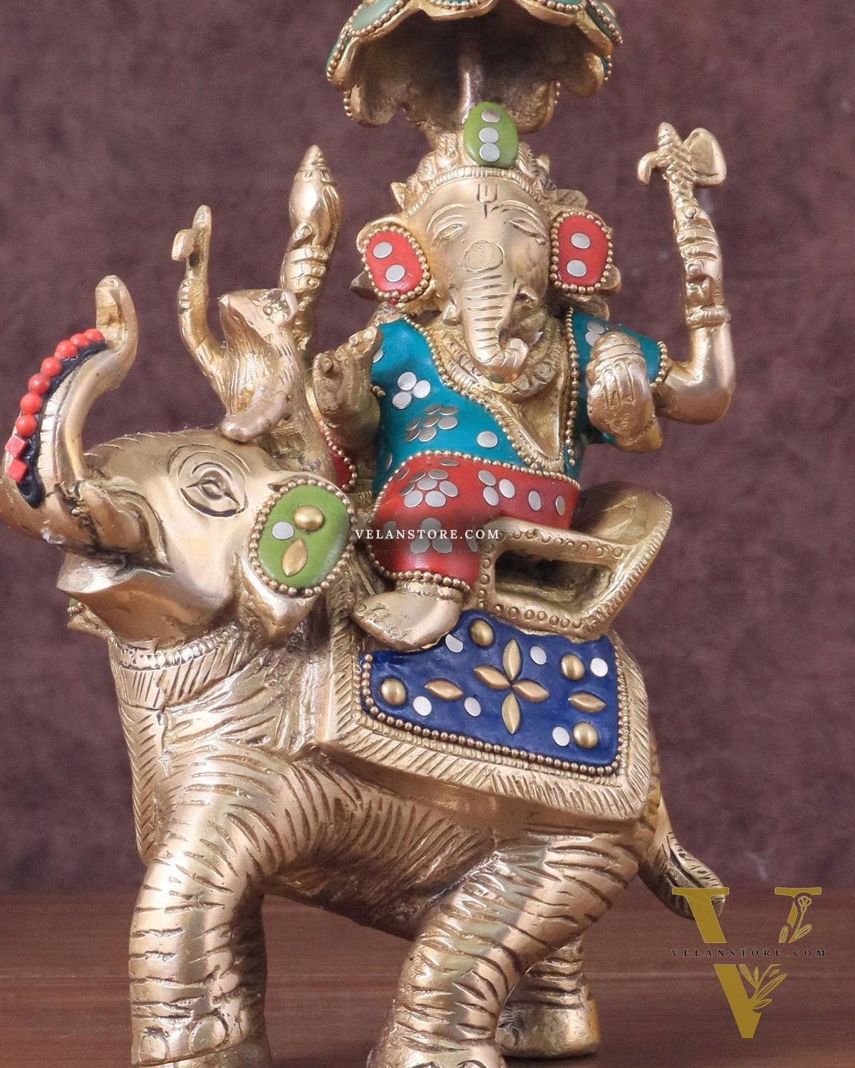 Lord Ganesha sitting on elephant meenakari brass statue