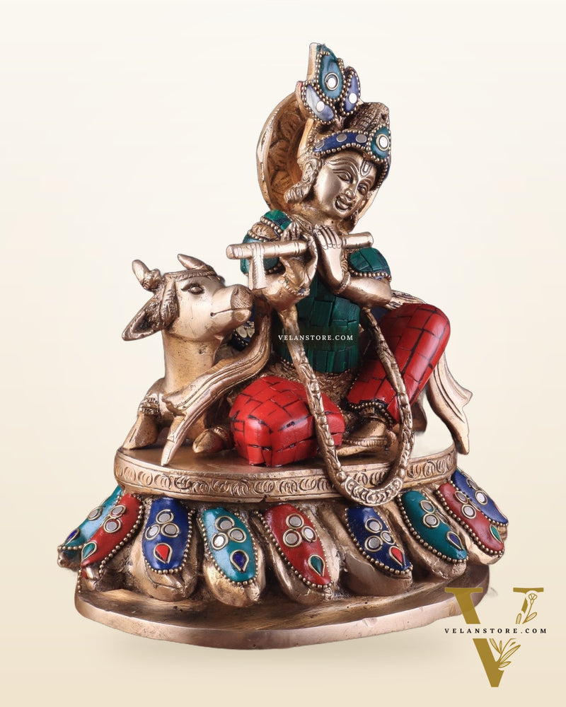 Lord krishna seated with cow brass idol with stonework 7.5 inch stonework