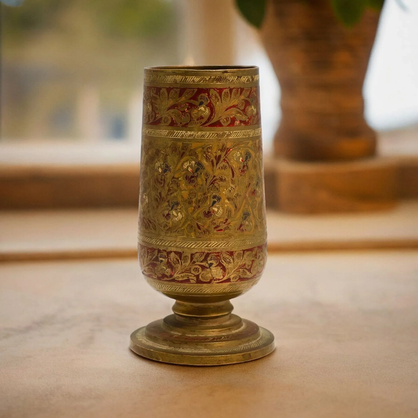 vintage brass glass with unique carving design