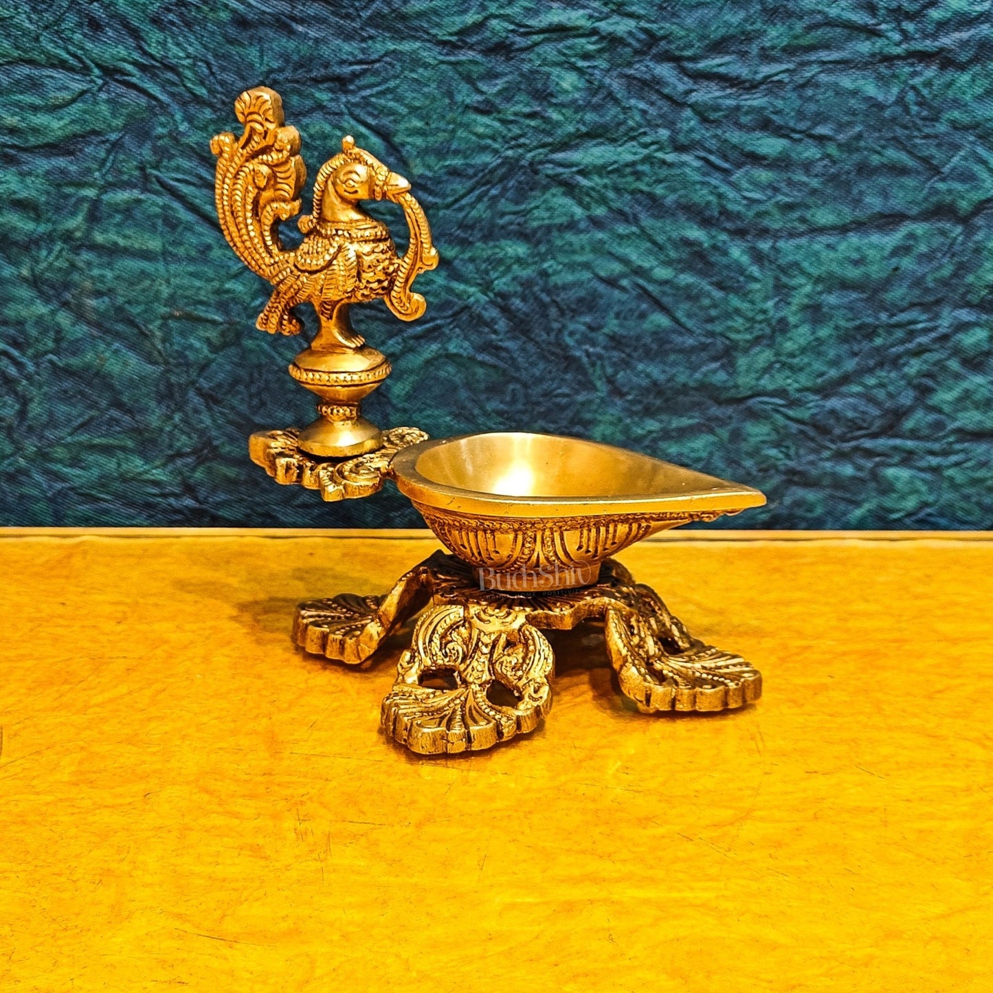 Peacock / annam design brass diya with 4 legged stand