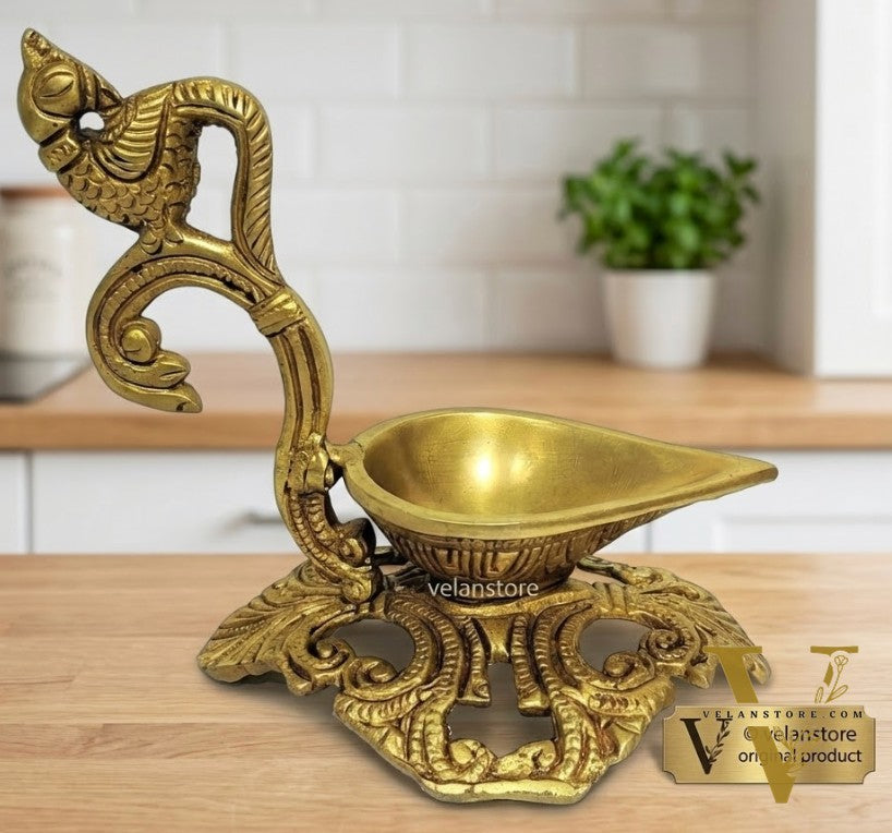Peacock / annam design brass diya with round engraved stand
