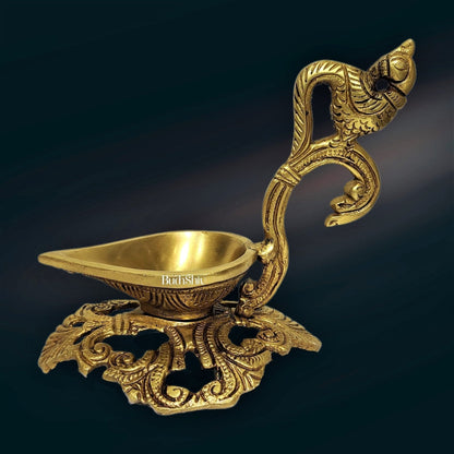 Peacock / annam design brass diya with round engraved stand