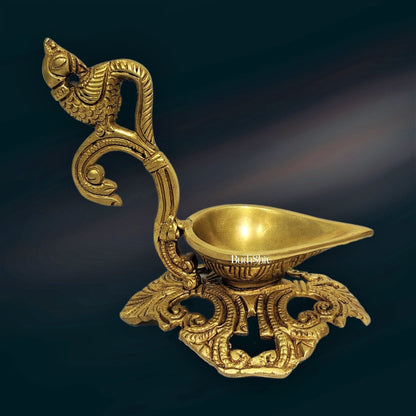 Peacock / annam design brass diya with round engraved stand
