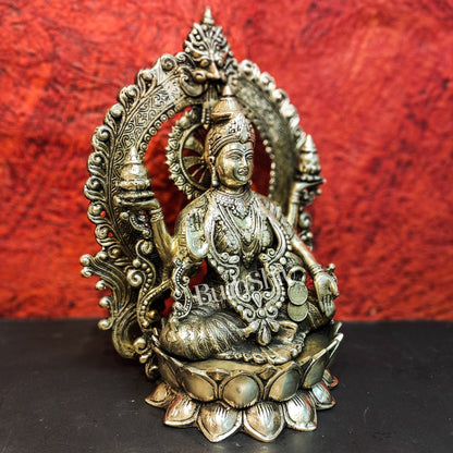 Pure Brass Handcrafted Lakshmi Idol on Lotus Base with Prabhavali Frame | 15.5"