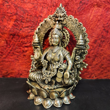Pure Brass Handcrafted Lakshmi Idol on Lotus Base with Prabhavali Frame | 15.5"