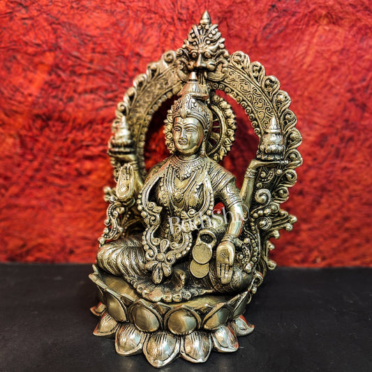 Pure Brass Handcrafted Lakshmi Idol on Lotus Base with Prabhavali Frame | 15.5"