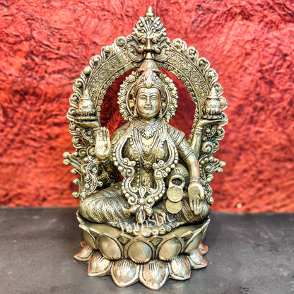 Pure Brass Handcrafted Lakshmi Idol on Lotus Base with Prabhavali Frame | 15.5"