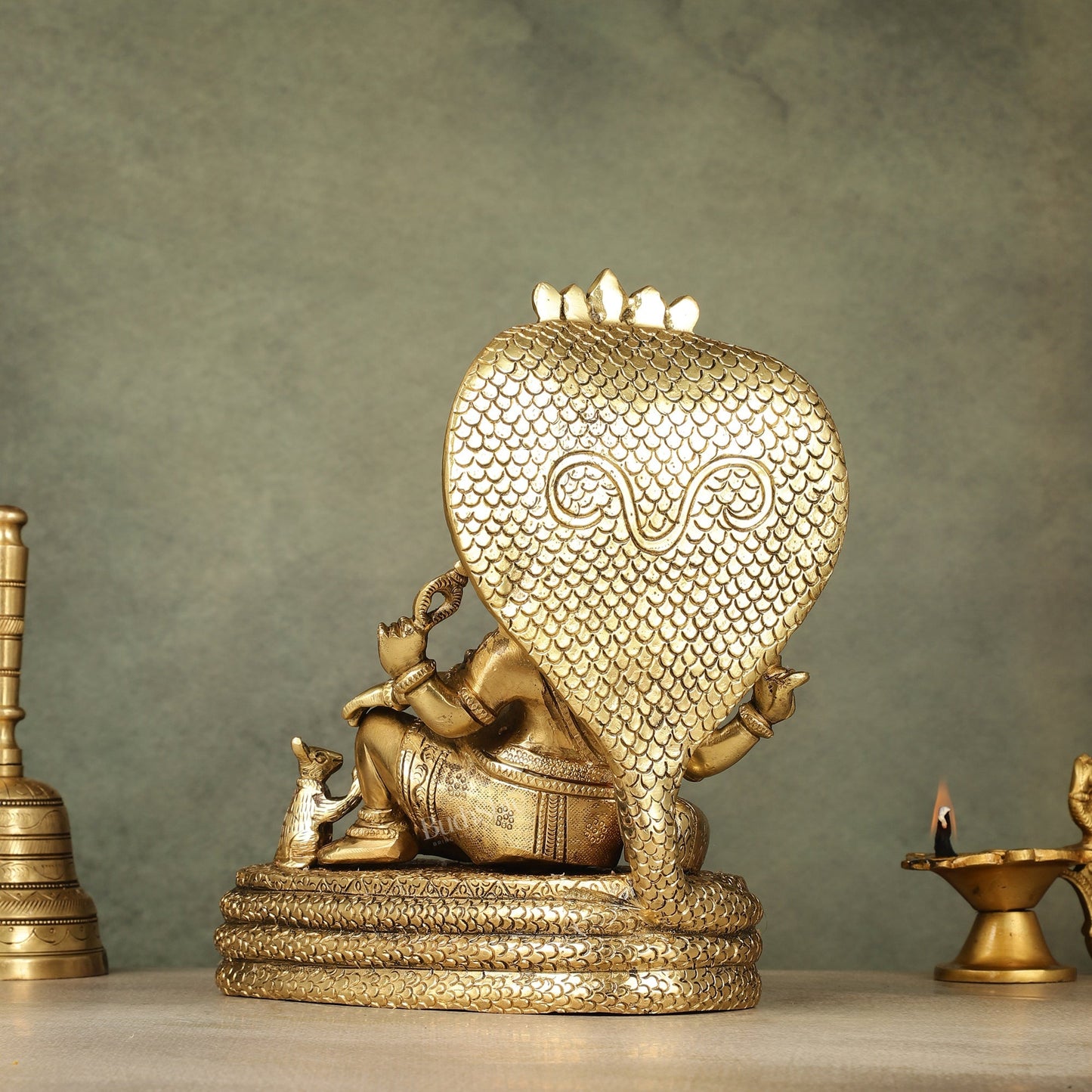 Pure Brass Lord Ganesha Resting on Sheshnaag – 10" x 9" x 5.5" | Divine & Artistic Idol