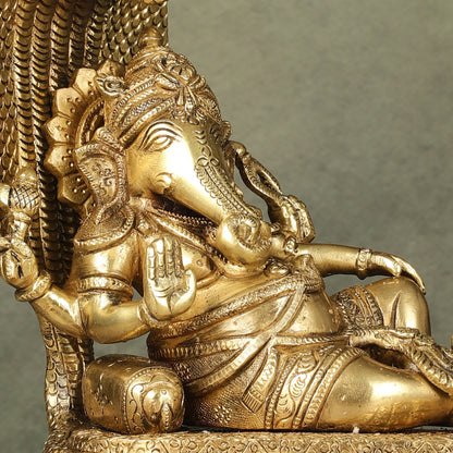 Pure Brass Lord Ganesha Resting on Sheshnaag – 10" x 9" x 5.5" | Divine & Artistic Idol